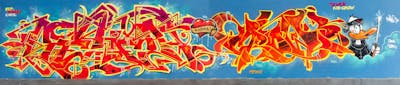 Red and Colorful Stylewriting by Kid Crow and SEWER. This Graffiti is located in Würzburg, Germany and was created in 2016. This Graffiti can be described as Stylewriting and Characters.