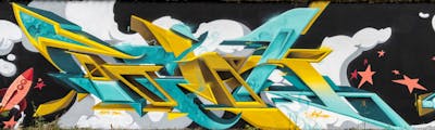 Cyan and Yellow Stylewriting by Tenk. This Graffiti is located in Delitzsch, Germany and was created in 2022. This Graffiti can be described as Stylewriting and Characters.