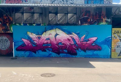 Coralle and Light Blue Stylewriting by Jaek and N3M crew. This Graffiti is located in Luxembourg, Luxembourg and was created in 2022. This Graffiti can be described as Stylewriting and Wall of Fame.
