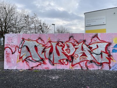 Coralle and Red and Chrome Stylewriting by Twis. This Graffiti is located in Germany and was created in 2024. This Graffiti can be described as Stylewriting and Wall of Fame.