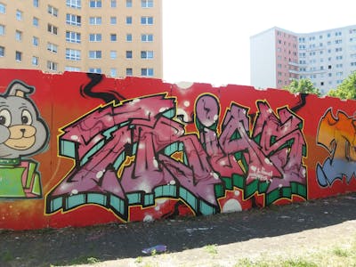 Coralle and Red and Colorful Stylewriting by Trias. This Graffiti is located in Germany and was created in 2023. This Graffiti can be described as Stylewriting, Characters and Wall of Fame.