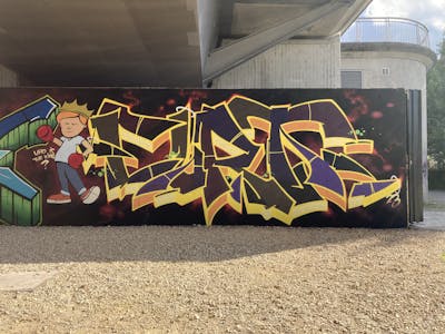 Yellow and Colorful Stylewriting by Curt. This Graffiti is located in Regensburg, Germany and was created in 2023. This Graffiti can be described as Stylewriting, Characters and Wall of Fame.