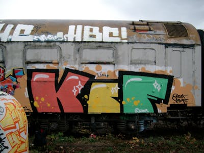 Colorful Stylewriting by urine and KCF. This Graffiti is located in Jena, Germany and was created in 2008. This Graffiti can be described as Stylewriting, Trains, Wall of Fame and Freights.