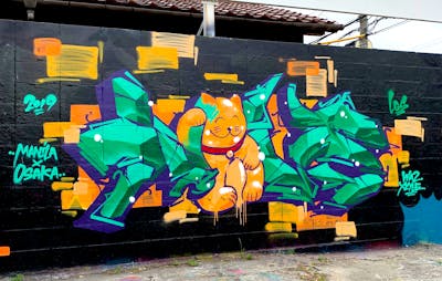 Cyan and Orange Stylewriting by Nevs. This Graffiti is located in Japan and was created in 2019. This Graffiti can be described as Stylewriting and Characters.
