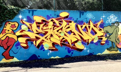 Colorful and Yellow Characters by Signo. This Graffiti is located in France and was created in 2022. This Graffiti can be described as Characters, Stylewriting and Wall of Fame.