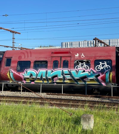 Colorful Stylewriting by Panik. This Graffiti is located in copenhagen, Denmark and was created in 2023. This Graffiti can be described as Stylewriting and Trains.