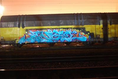Light Blue Stylewriting by DCK, Angel and ALL CAPS COLLECTIVE. This Graffiti is located in Hungary and was created in 2019. This Graffiti can be described as Stylewriting, Trains and Freights.