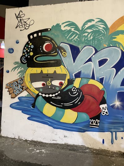 Colorful Characters by KG. This Graffiti is located in Bangkok, Thailand and was created in 2023.