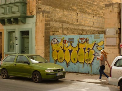Yellow Stylewriting by Riots. This Graffiti is located in Malta and was created in 2013. This Graffiti can be described as Stylewriting, Street Bombing and Handstyles.