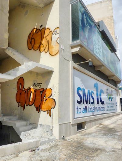 Orange and Black Handstyles by Riots and coun. This Graffiti is located in Malta and was created in 2012. This Graffiti can be described as Handstyles, Street Bombing, Stylewriting and Throw Up.