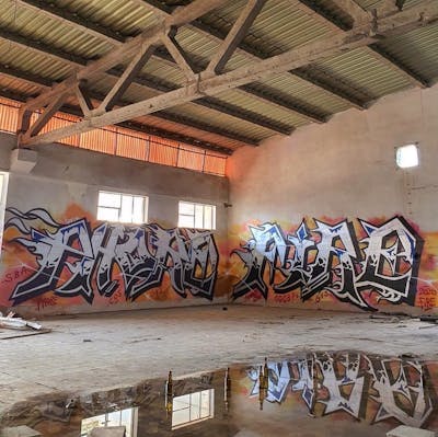 Chrome and Colorful Stylewriting by Fire and Phore. This Graffiti is located in Lisboa, Portugal and was created in 2020. This Graffiti can be described as Stylewriting and Abandoned.