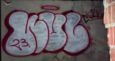 White and Red Throw Up by NULL. This Graffiti is located in Sândominic, Romania and was created in 2023.