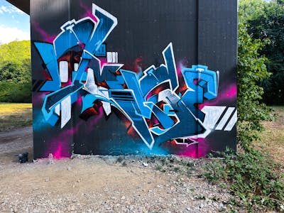 Light Blue and Colorful Stylewriting by omseg. This Graffiti is located in Lörrach, Germany and was created in 2022.