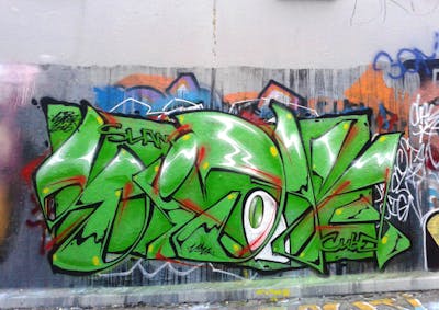 Green and Red and Black Stylewriting by SIDOK. This Graffiti is located in London, United Kingdom and was created in 2016. This Graffiti can be described as Stylewriting and Wall of Fame.