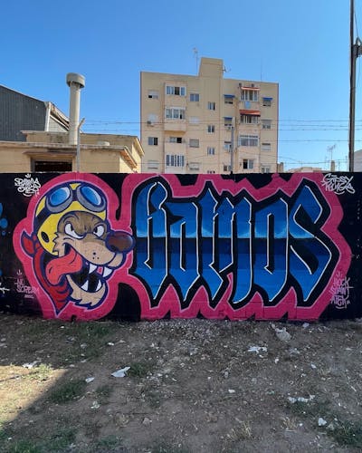Colorful and Red and Blue Stylewriting by Bamos. This Graffiti is located in Valencia, Spain and was created in 2023. This Graffiti can be described as Stylewriting and Characters.