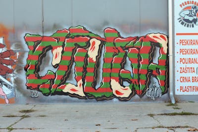 Green and Red Stylewriting by 7AM. This Graffiti is located in Novi Sad, Serbia and was created in 2022.
