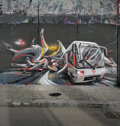 Grey and Red Stylewriting by Caer8th. This Graffiti is located in Prague, Czech Republic and was created in 2023. This Graffiti can be described as Stylewriting, Characters, 3D and Wall of Fame.