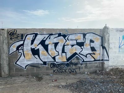 White and Black Stylewriting by KNEB. This Graffiti is located in Cyprus and was created in 2022. This Graffiti can be described as Stylewriting and Street Bombing.