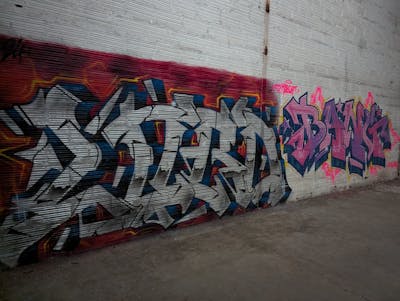 Chrome and Colorful Stylewriting by LORD and Bang. This Graffiti is located in Caen, France and was created in 2024. This Graffiti can be described as Stylewriting and Abandoned.