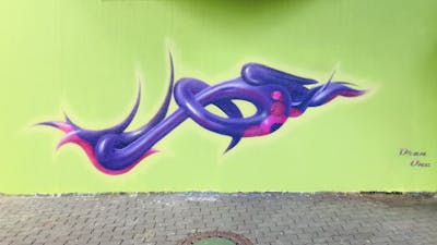 Violet and Light Green Stylewriting by OranOne. This Graffiti is located in Germany and was created in 2024. This Graffiti can be described as Stylewriting and 3D.