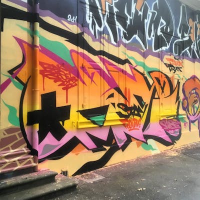 Orange and Coralle Stylewriting by Moosem135. This Graffiti is located in Basel, Switzerland and was created in 2018. This Graffiti can be described as Stylewriting and Wall of Fame.