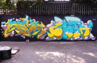 Yellow and Cyan and Coralle Stylewriting by Nevs and Zeta. This Graffiti is located in Philippines and was created in 2023.