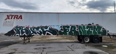 Green and White Stylewriting by Phuse and fantm. This Graffiti is located in United States and was created in 2022. This Graffiti can be described as Stylewriting and Cars.