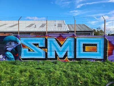 Light Blue and Colorful Stylewriting by smo__crew and Sky High. This Graffiti is located in London, United Kingdom and was created in 2021. This Graffiti can be described as Stylewriting and Characters.