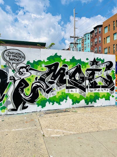 Grey and Light Green Stylewriting by MOI. This Graffiti is located in Jersey City, United States and was created in 2022. This Graffiti can be described as Stylewriting and Characters.