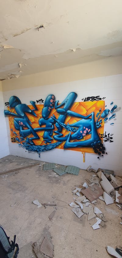 Orange and Light Blue Stylewriting by fil, gd, urbs and mtr. This Graffiti is located in Lleida, Spain and was created in 2023. This Graffiti can be described as Stylewriting, Abandoned and 3D.