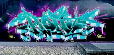 Cyan and Colorful Stylewriting by KonT. This Graffiti is located in Lüdenscheid, Germany and was created in 2022. This Graffiti can be described as Stylewriting and Wall of Fame.