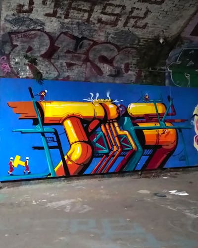 Orange and Light Blue Stylewriting by Tris. This Graffiti is located in London, United Kingdom and was created in 2023. This Graffiti can be described as Stylewriting, Characters, 3D and Wall of Fame.