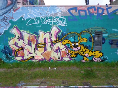 Colorful Stylewriting by Font. This Graffiti is located in s´Hertogenbosch, Netherlands and was created in 2013. This Graffiti can be described as Stylewriting, Characters and Wall of Fame.