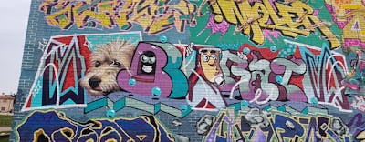 Colorful Stylewriting by Brat and Sles. This Graffiti is located in Croatia and was created in 2023. This Graffiti can be described as Stylewriting, Characters and Wall of Fame.