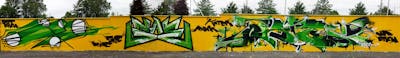 Green and Yellow Stylewriting by urine, mobar, Köter, OST and Sae. This Graffiti is located in Delitzsch, Germany and was created in 2014. This Graffiti can be described as Stylewriting and Wall of Fame.