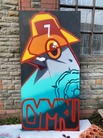 Colorful Characters by Hyro. This Graffiti is located in Treherbert,, United Kingdom and was created in 2024. This Graffiti can be described as Characters and Canvas.