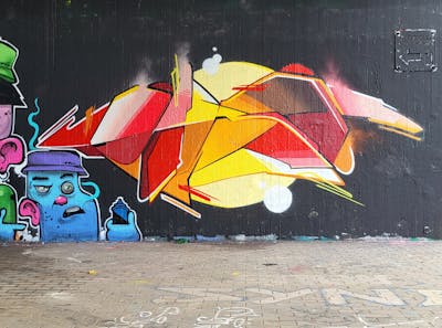 Colorful and Orange and Red Stylewriting by Dirt and Lowrong. This Graffiti is located in Leipzig, Germany and was created in 2023. This Graffiti can be described as Stylewriting, Characters, Streetart and Wall of Fame.