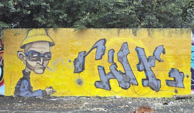 Yellow and Grey and Beige Stylewriting by Cime and Fier. This Graffiti is located in Budapest, Hungary and was created in 2016. This Graffiti can be described as Stylewriting and Characters.