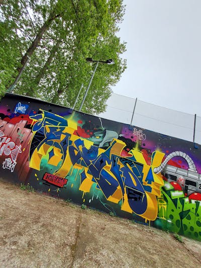 Yellow and Blue and Colorful Stylewriting by Fems173. This Graffiti is located in lublin, Poland and was created in 2023. This Graffiti can be described as Stylewriting, Characters and Murals.