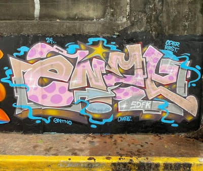 Beige and Coralle and Colorful Stylewriting by SDFK, Enzy1 and SWL. This Graffiti is located in Philippines and was created in 2024.