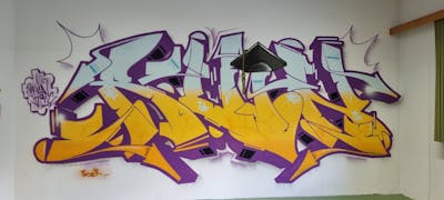 Violet and Yellow and Light Blue Stylewriting by Ruin. This Graffiti is located in Innsbruck, Austria and was created in 2023.