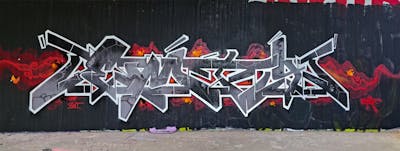 Grey and Red and White Stylewriting by Emty. This Graffiti is located in Wiesbaden, Germany and was created in 2023. This Graffiti can be described as Stylewriting and Wall of Fame.