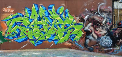 Light Green and Light Blue and Brown Stylewriting by DavePlant, Chips and CDSK. This Graffiti is located in London, United Kingdom and was created in 2023. This Graffiti can be described as Stylewriting, Wall of Fame and Characters.