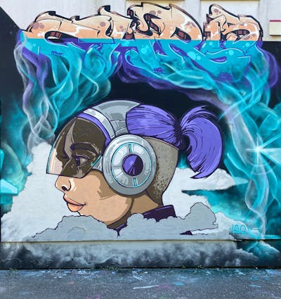 Cyan and Violet and Orange Murals by Graff.Funk, Chr15, Lagqaffe and LGQ. This Graffiti is located in Leipzig, Germany and was created in 2023. This Graffiti can be described as Murals, Stylewriting and Characters.