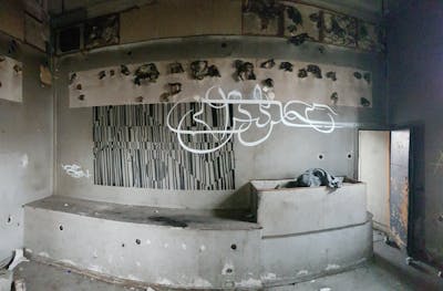 Black and White Handstyles by urine and OST. This Graffiti is located in Athens, Greece and was created in 2020. This Graffiti can be described as Handstyles, Abandoned and Futuristic.