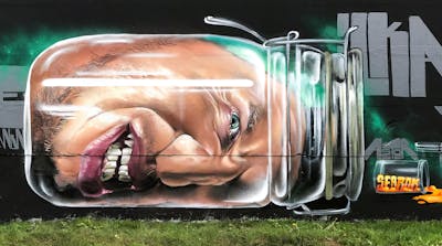 Colorful Characters by Searok. This Graffiti is located in Greifswald, Germany and was created in 2019. This Graffiti can be described as Characters and Streetart.