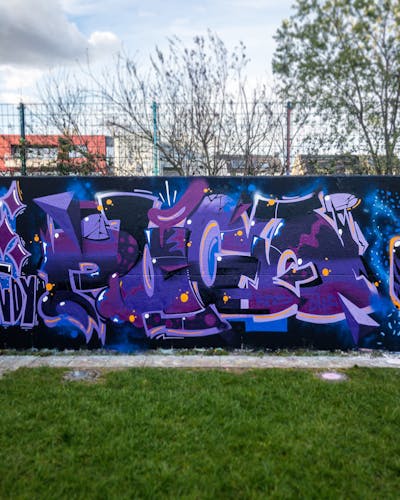 Violet and Blue Stylewriting by PUCK. This Graffiti is located in cologne, Germany and was created in 2023. This Graffiti can be described as Stylewriting and Wall of Fame.