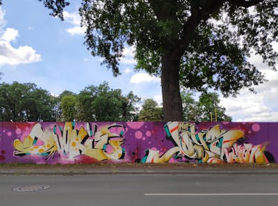 Colorful and Beige and Violet Stylewriting by Dj Dookie and JOYS. This Graffiti is located in Lippstadt, Germany and was created in 2022.