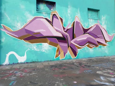 Cyan and Violet and Brown Stylewriting by Dirt. This Graffiti is located in Leipzig, Germany and was created in 2022. This Graffiti can be described as Stylewriting and Wall of Fame.