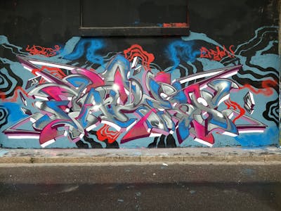 Grey and Colorful Wall of Fame by Fares. This Graffiti is located in Milano, Italy and was created in 2021. This Graffiti can be described as Wall of Fame and Stylewriting.